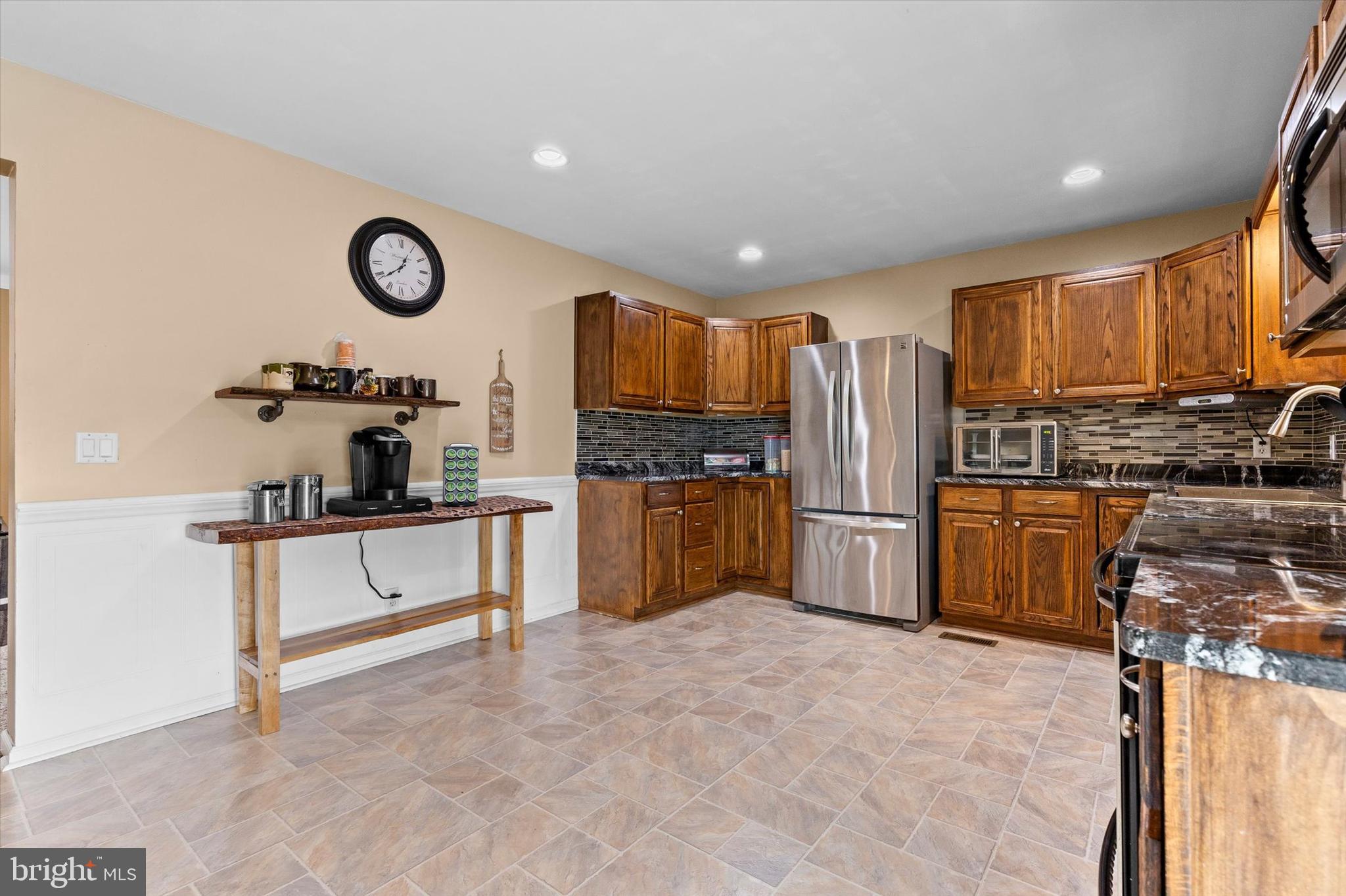 635 Newport Road Duncannon, PA 17020 - Photo 15 of 55 a kitchen with stainless steel appliances a refrigerator and a stove top oven