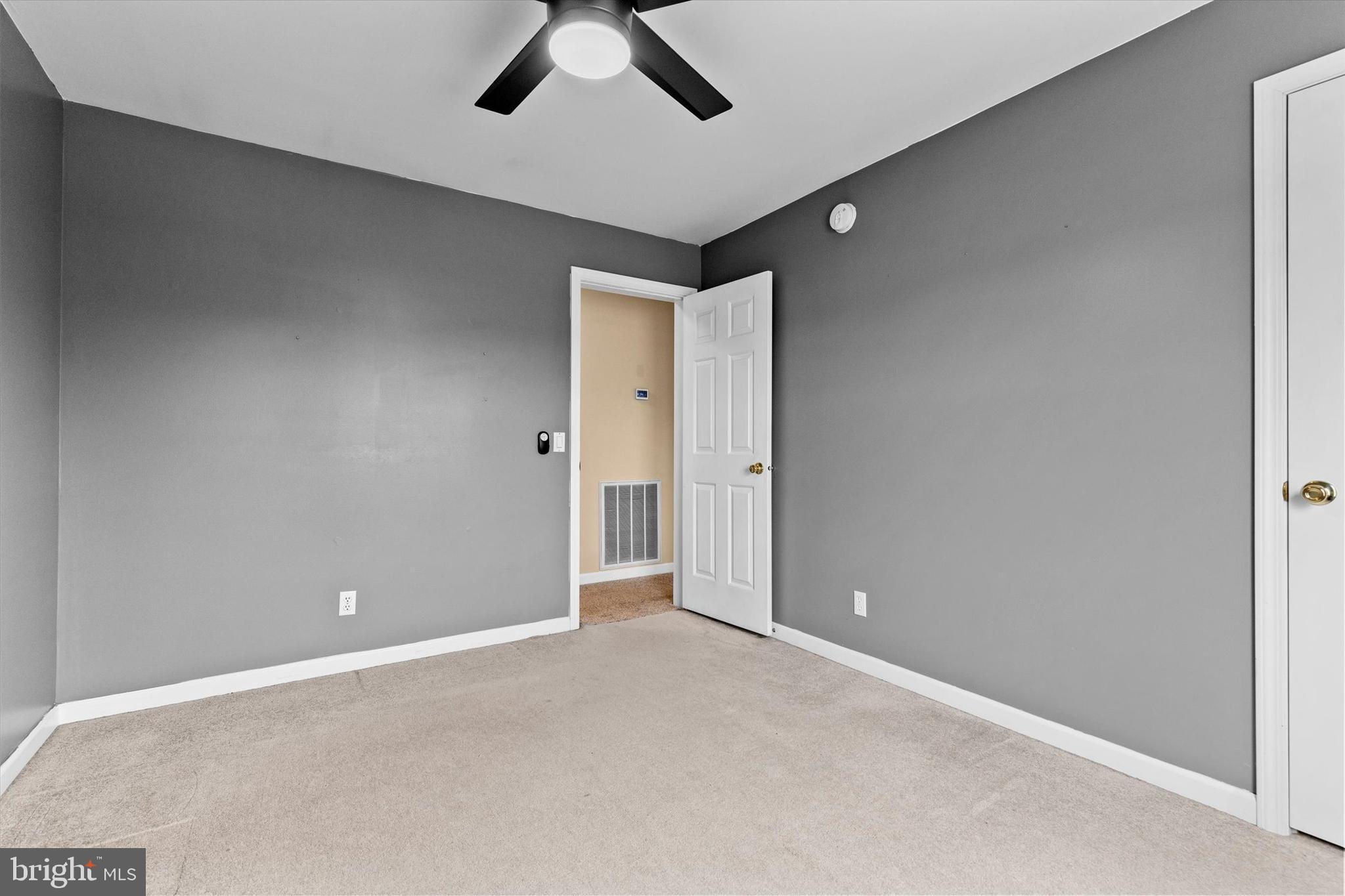 635 Newport Road Duncannon, PA 17020 - Photo 19 of 55 an empty room with chandelier fan and windows