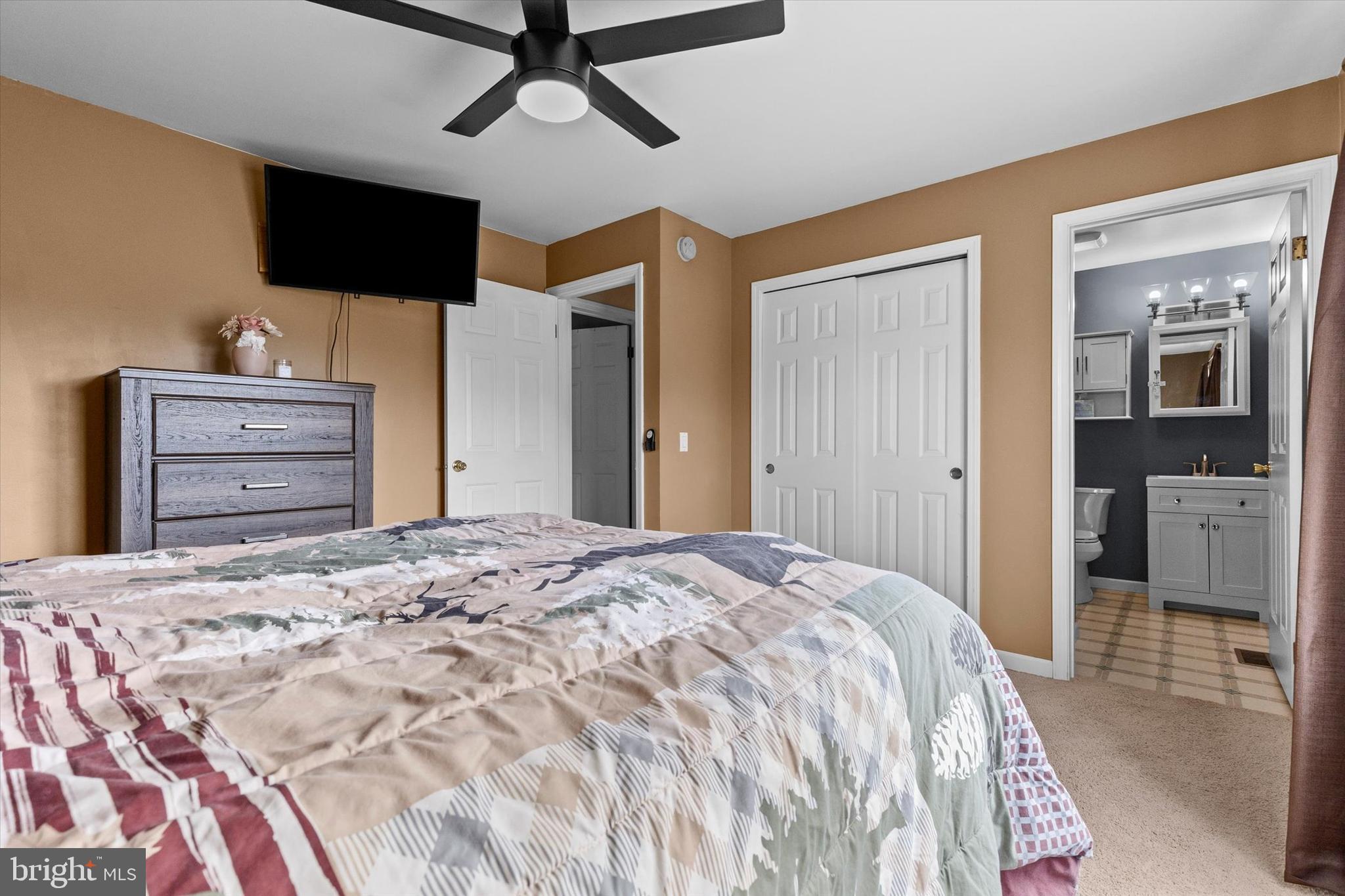 635 Newport Road Duncannon, PA 17020 - Photo 24 of 55 a bedroom with a bed and a flat tv screen on dresser