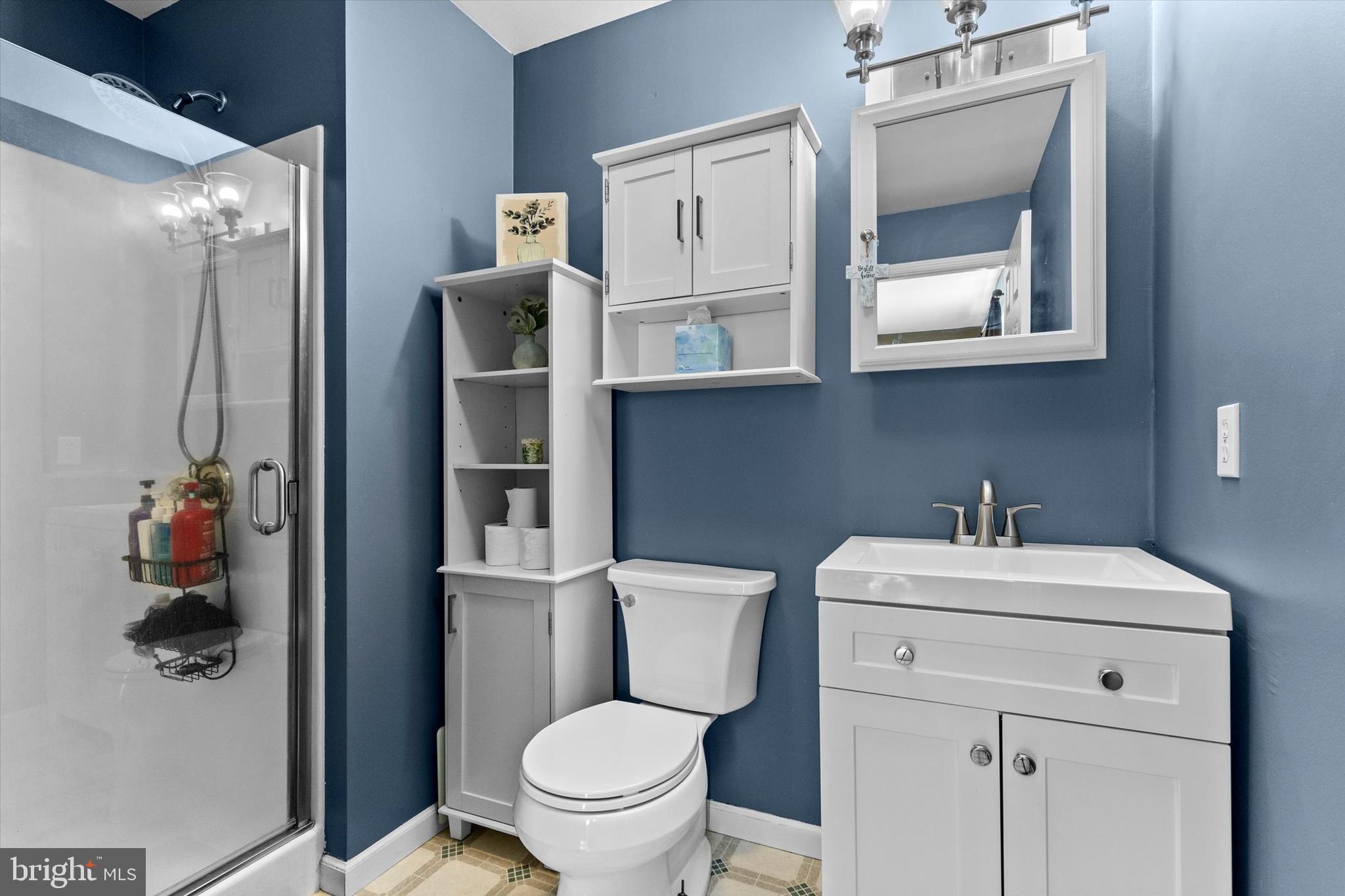 635 Newport Road Duncannon, PA 17020 - Photo 25 of 55 a bathroom with a toilet sink and mirror