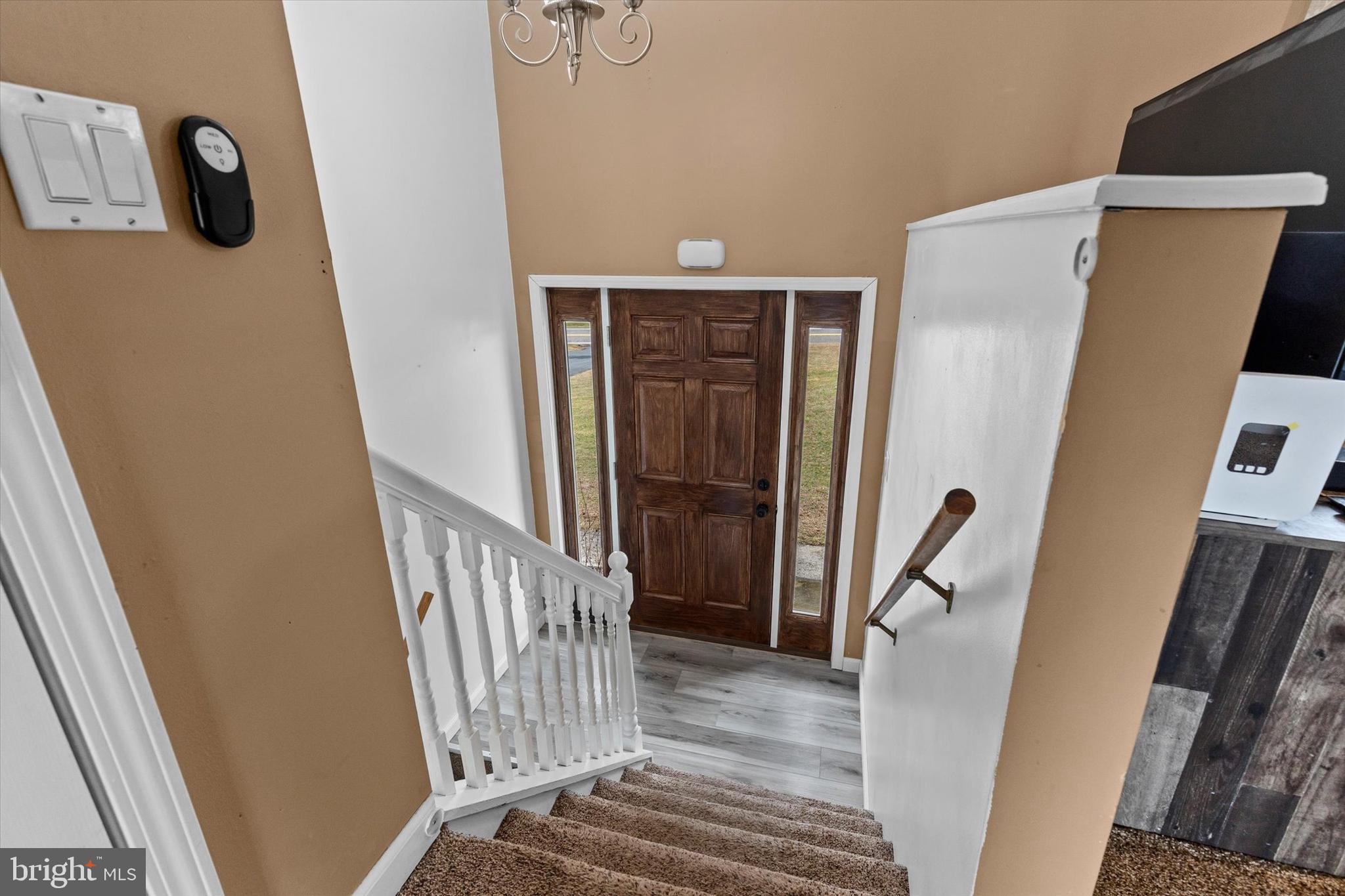 635 Newport Road Duncannon, PA 17020 - Photo 7 of 55 a view of a hallway with wooden floor and staircase