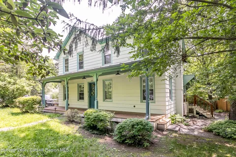front view of a house with a big yard