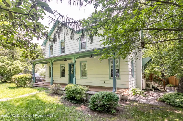 front view of a house with a big yard