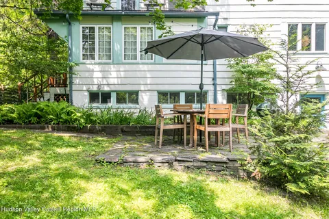 a house view with a garden space