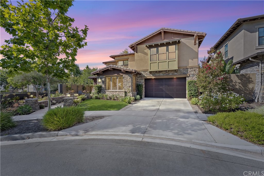 127 Cruiser Irvine, CA 92618 - Photo 1 of 2 a front view of a house with a yard and garage