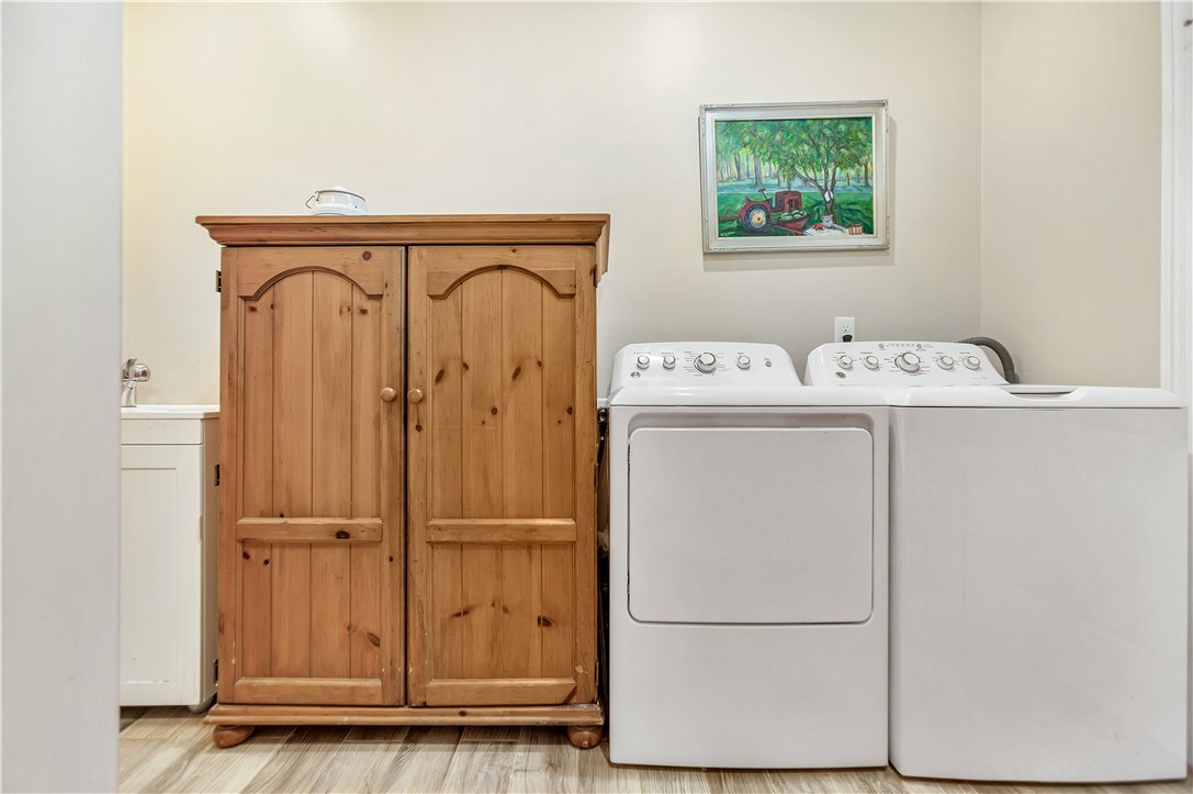 1204 Cherokee Road Townville, SC 29689 - Photo 18 of 44 A dedicated laundry space provides practical amenities for household chores.