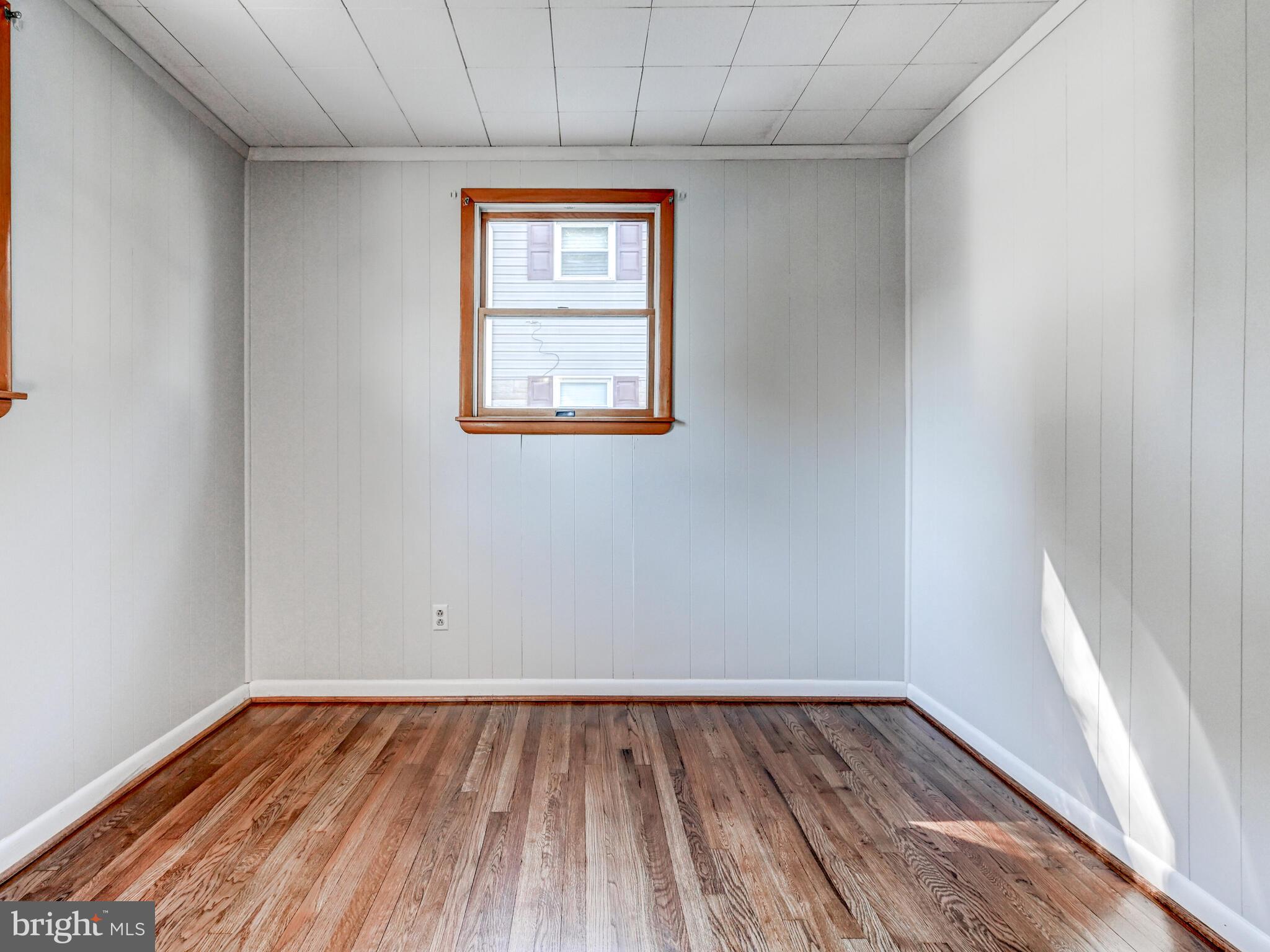 609 South Rogers Street Aberdeen, MD 21001 - Photo 17 of 45 a view of a room with wooden floor and window