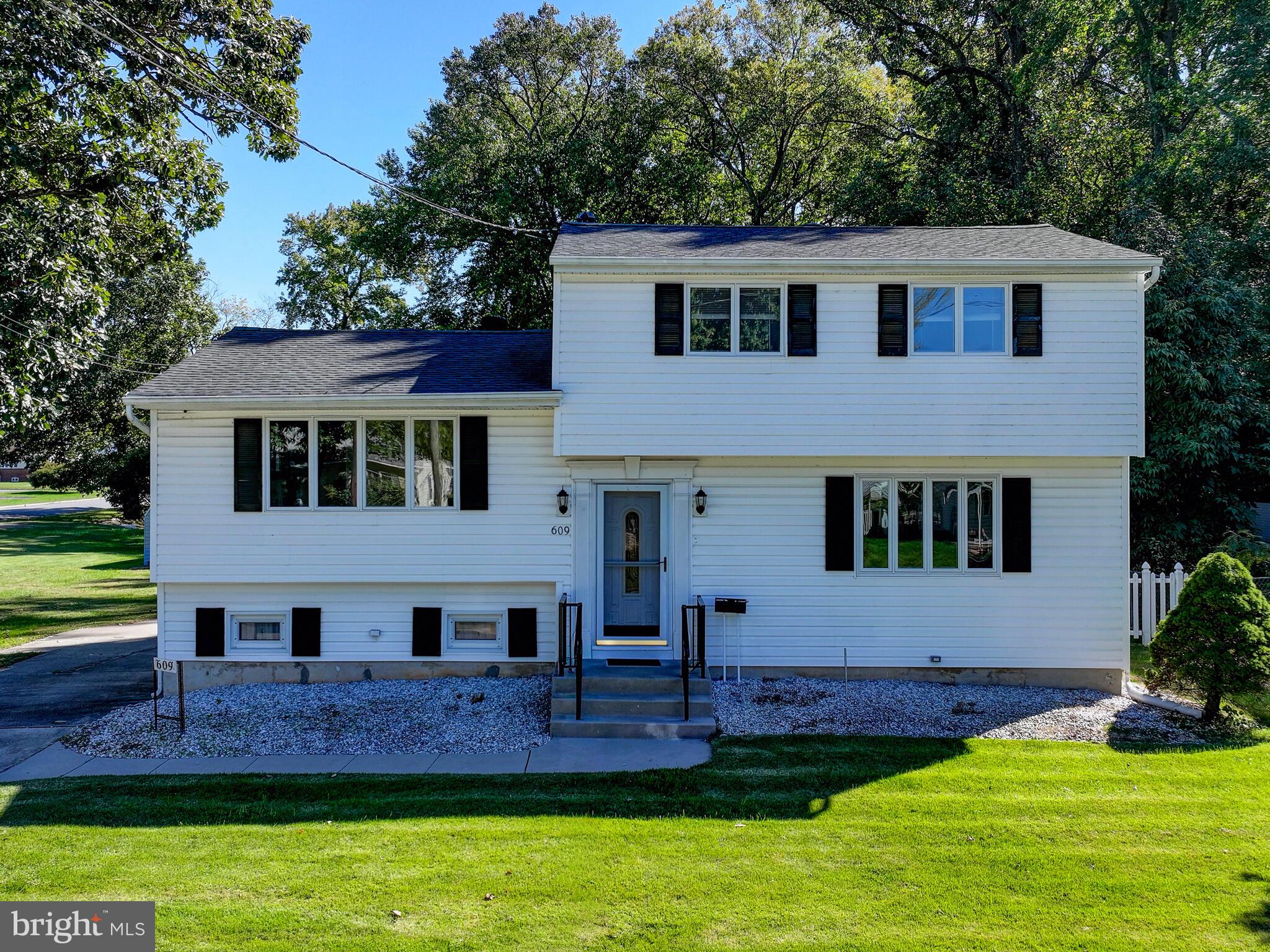 609 South Rogers Street Aberdeen, MD 21001 - Photo 2 of 45 a front view of a house with a yard