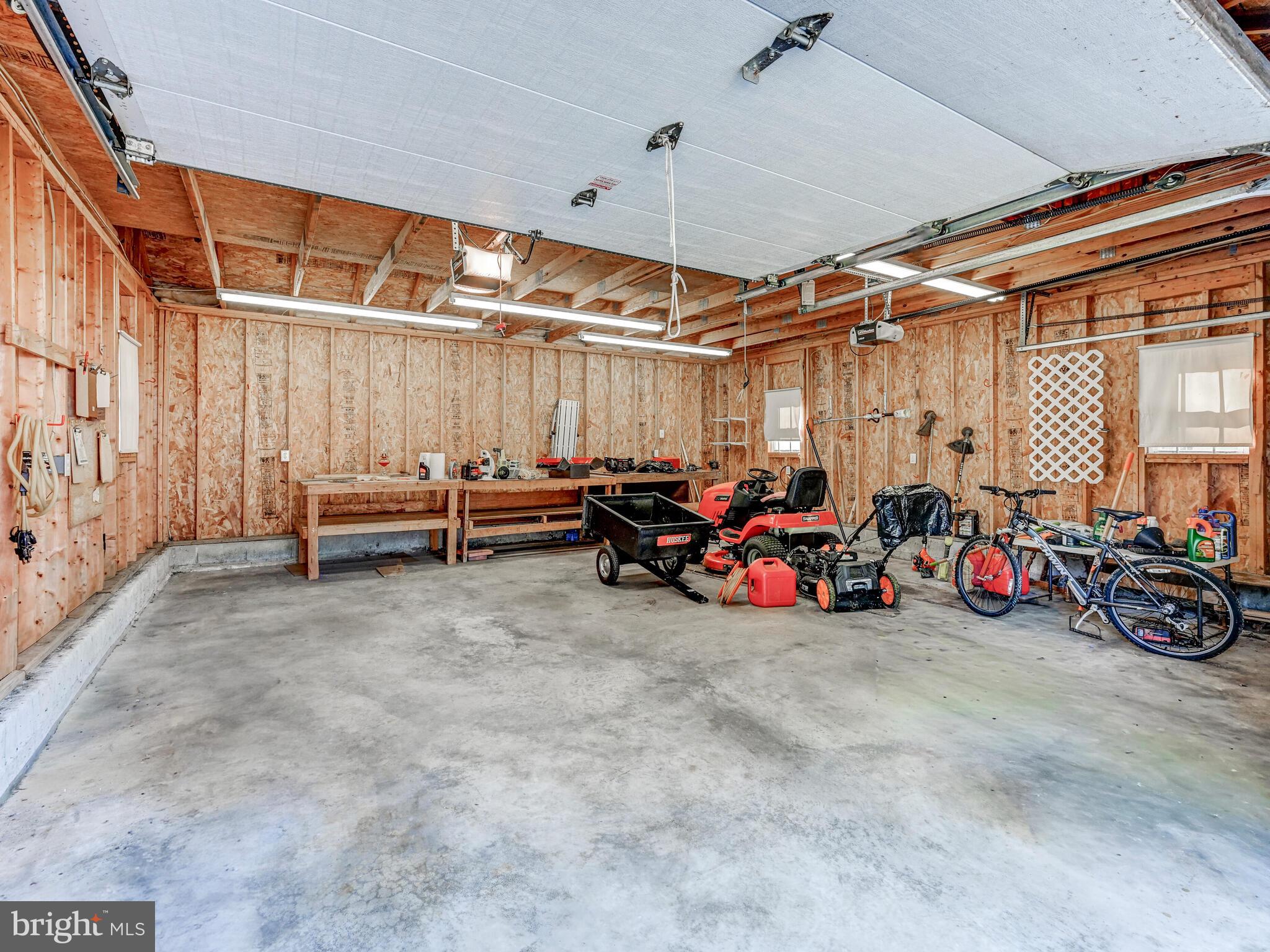 609 South Rogers Street Aberdeen, MD 21001 - Photo 25 of 45 a view of a storage room with a table and chairs