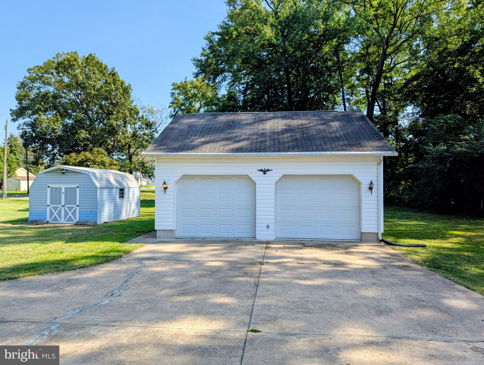 609 South Rogers Street Aberdeen, MD 21001 - Photo 41 of 45 a view of a house with a yard and garage