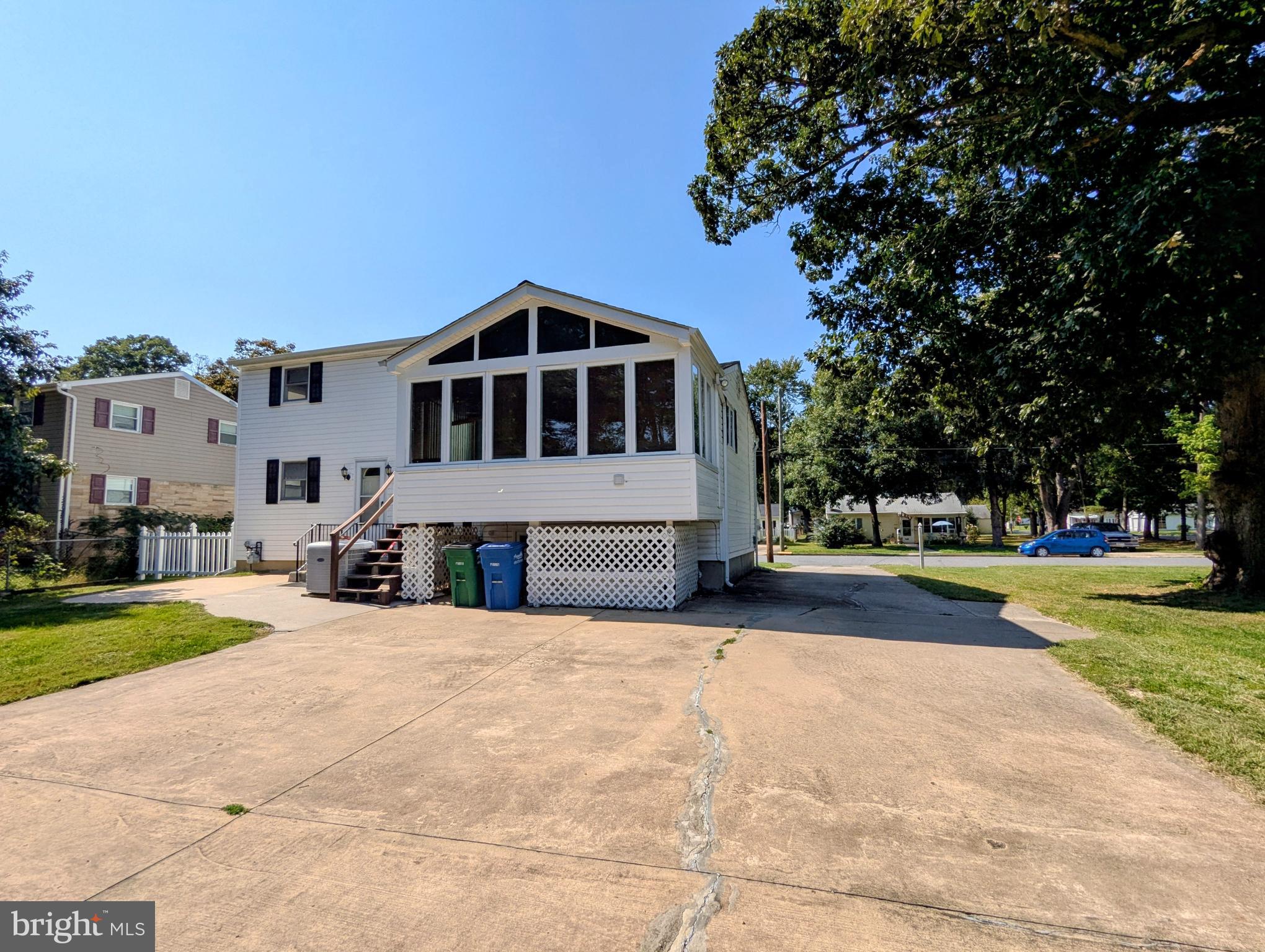 609 South Rogers Street Aberdeen, MD 21001 - Photo 42 of 45 a front view of a house with a yard and garage