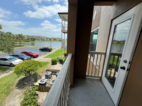 a view of living room and balcony