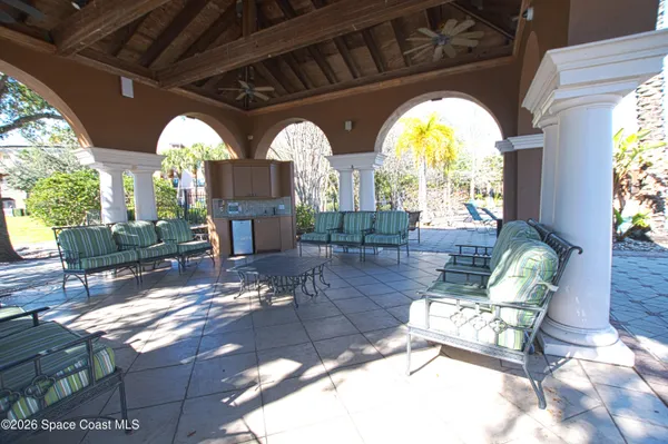 a view of a terrace with sitting area
