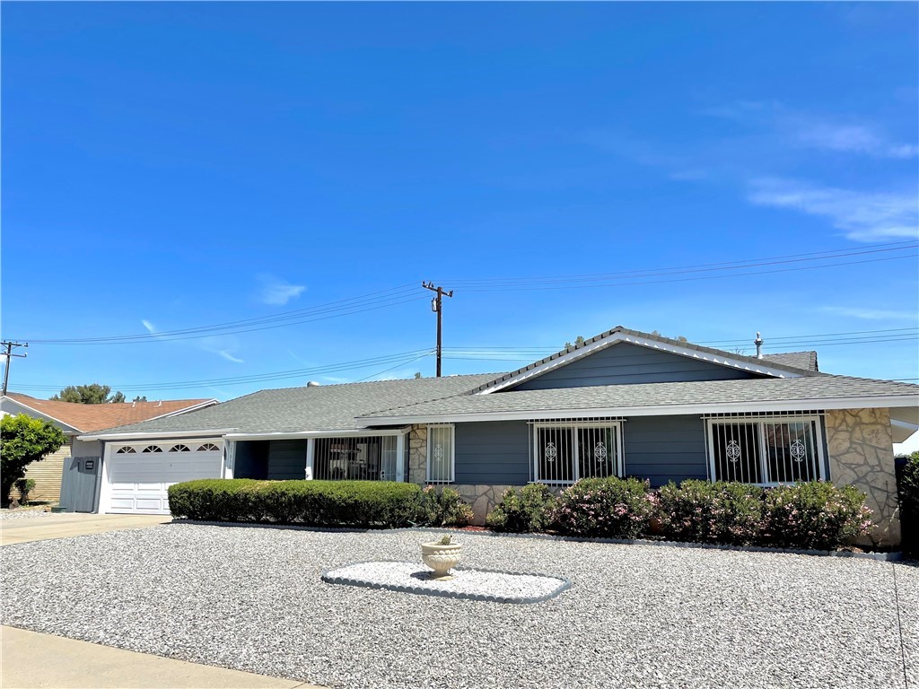 25830 Ridgemoor Road Menifee, CA 92586 - Photo 1 of 1 a front view of a house with a yard
