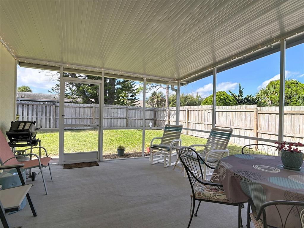 1408 3rd Street Edgewater, FL 32132 - Photo 28 of 43 a view of swimming pool with outdoor seating