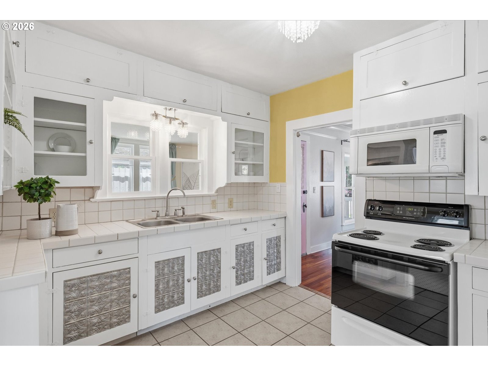 170 Northeast Main Street Estacada, OR 97023 - Photo 15 of 41 a kitchen with stainless steel appliances a stove sink and cabinets