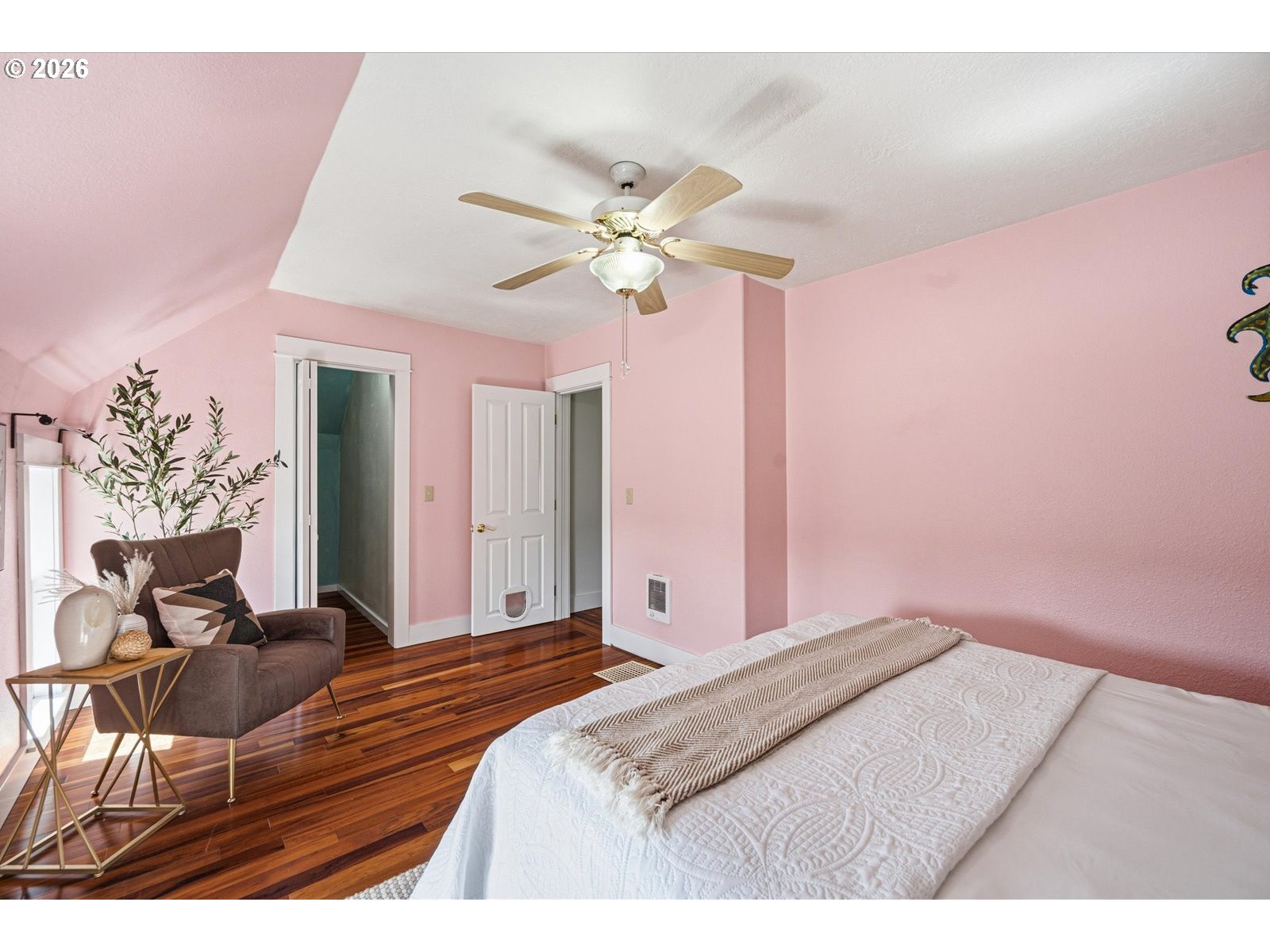 170 Northeast Main Street Estacada, OR 97023 - Photo 28 of 41 a bedroom with a bed dresser and a chandelier