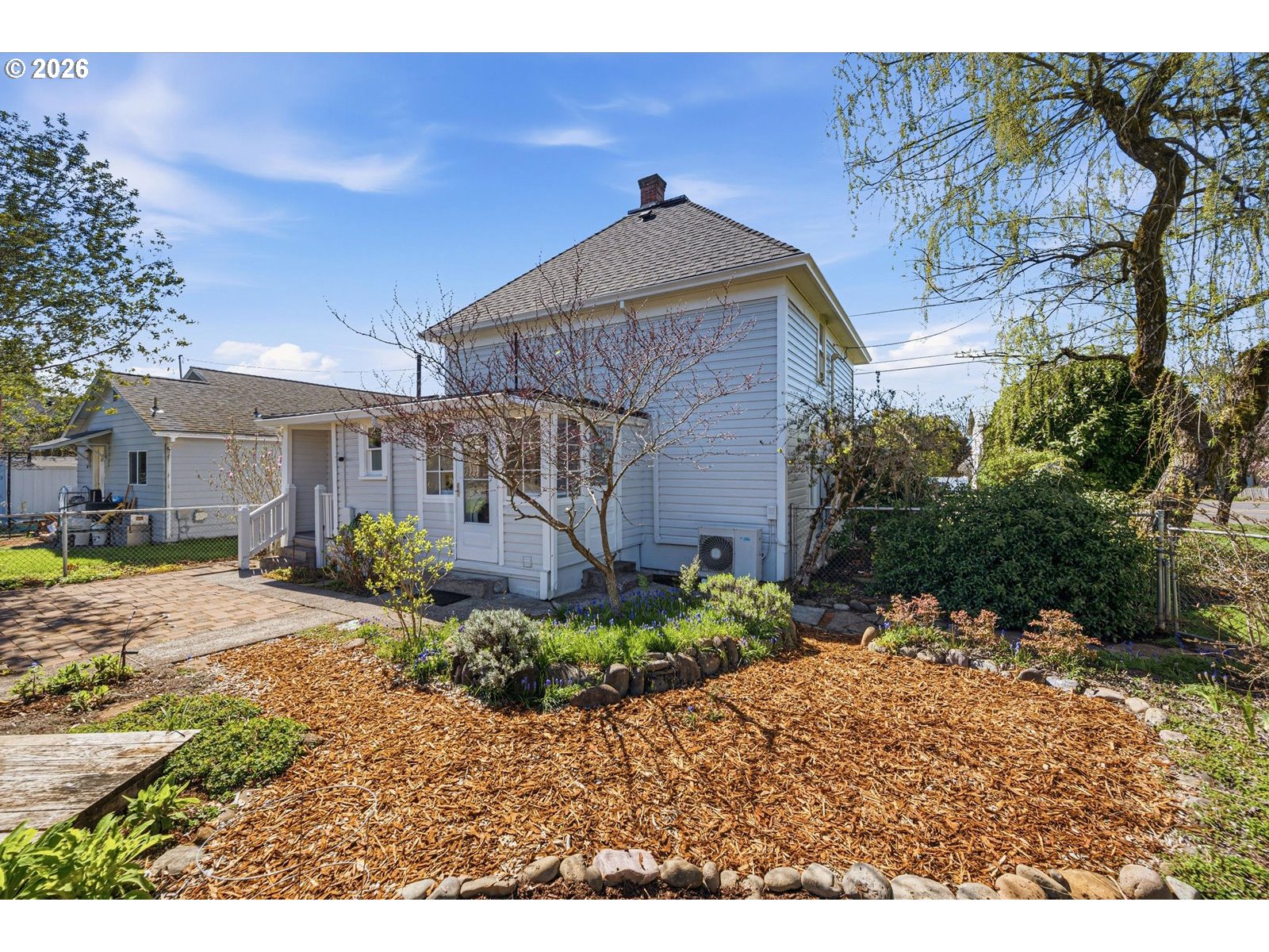 170 Northeast Main Street Estacada, OR 97023 - Photo 32 of 41 a front view of a house with a garden