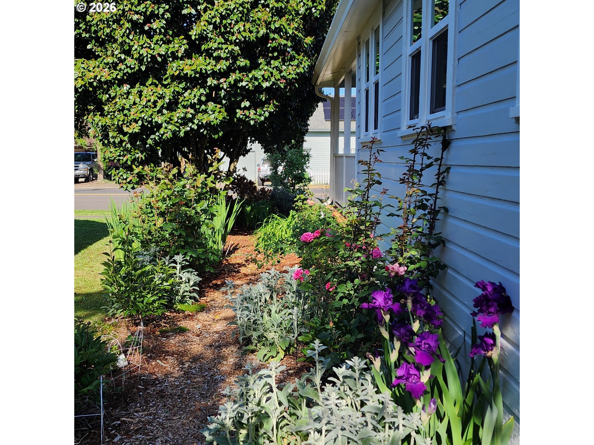 170 Northeast Main Street Estacada, OR 97023 - Photo 38 of 41 a view of a house with a flower garden