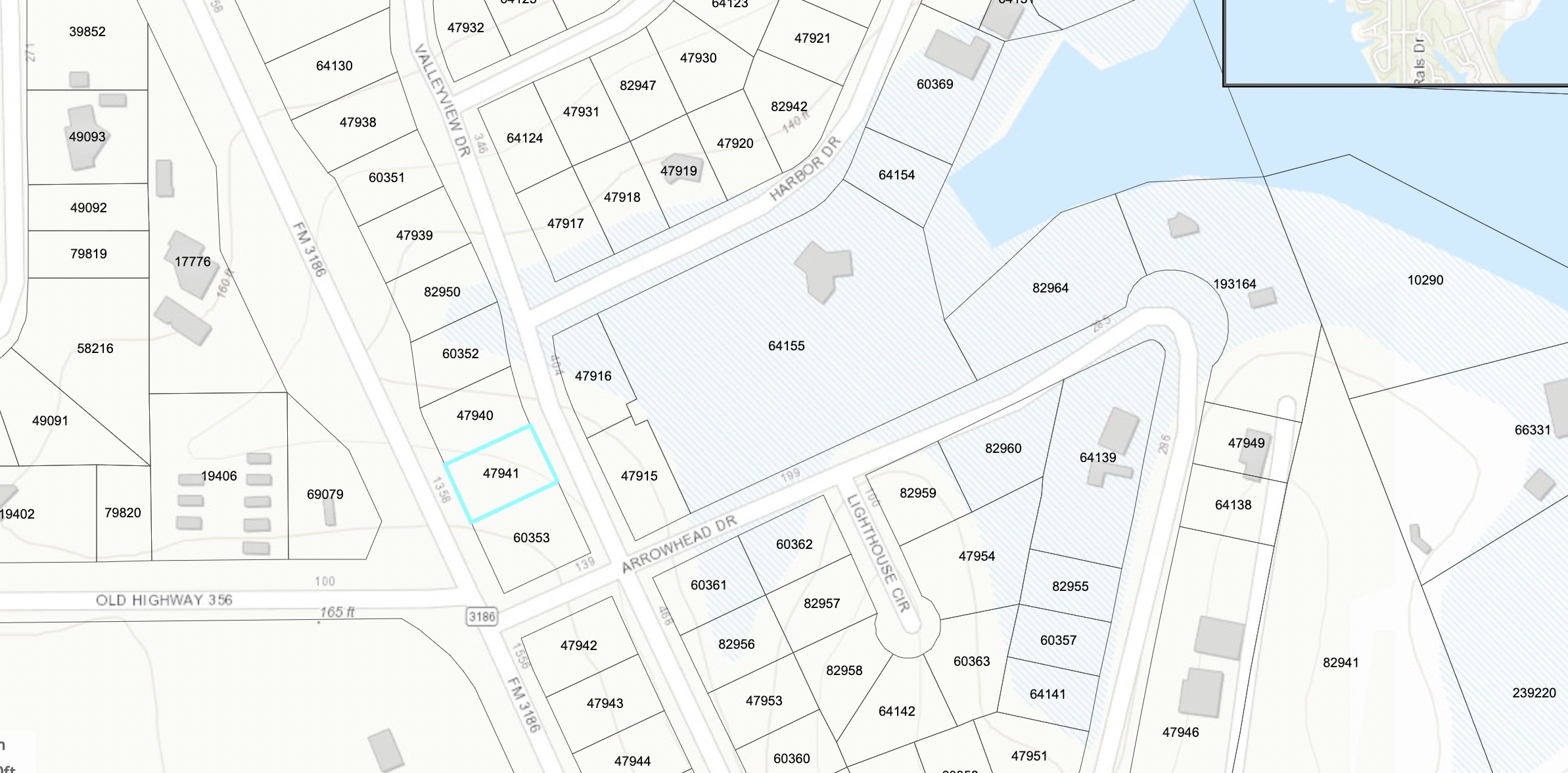 Tbddd Valleyview Drive Onalaska, TX 77360 - Photo 2 of 3 a picture of a bathroom with mirror and shower