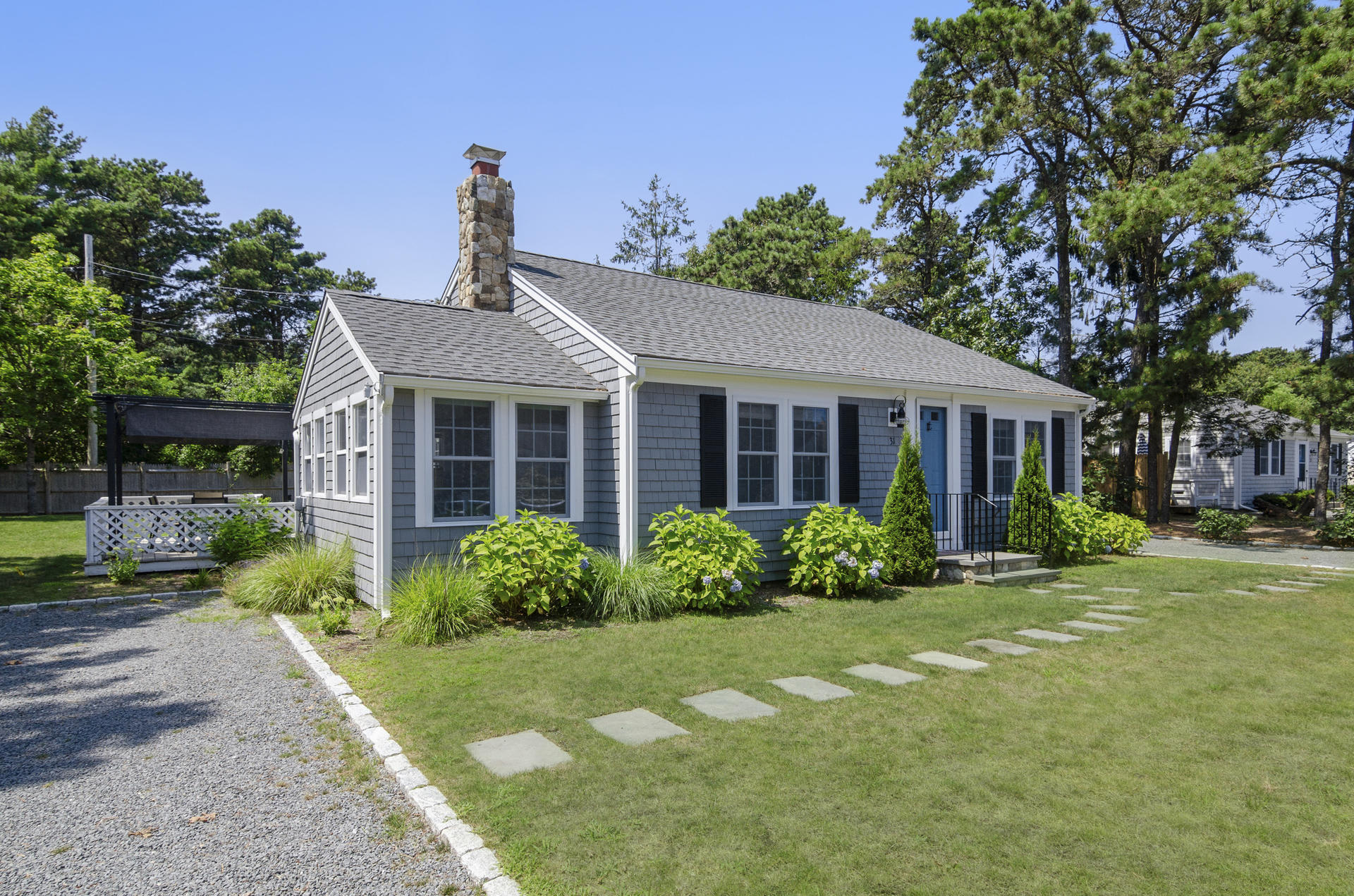31 Glendon Road Dennis Port, MA 02639 - Photo 1 of 21 a front view of a house with a yard