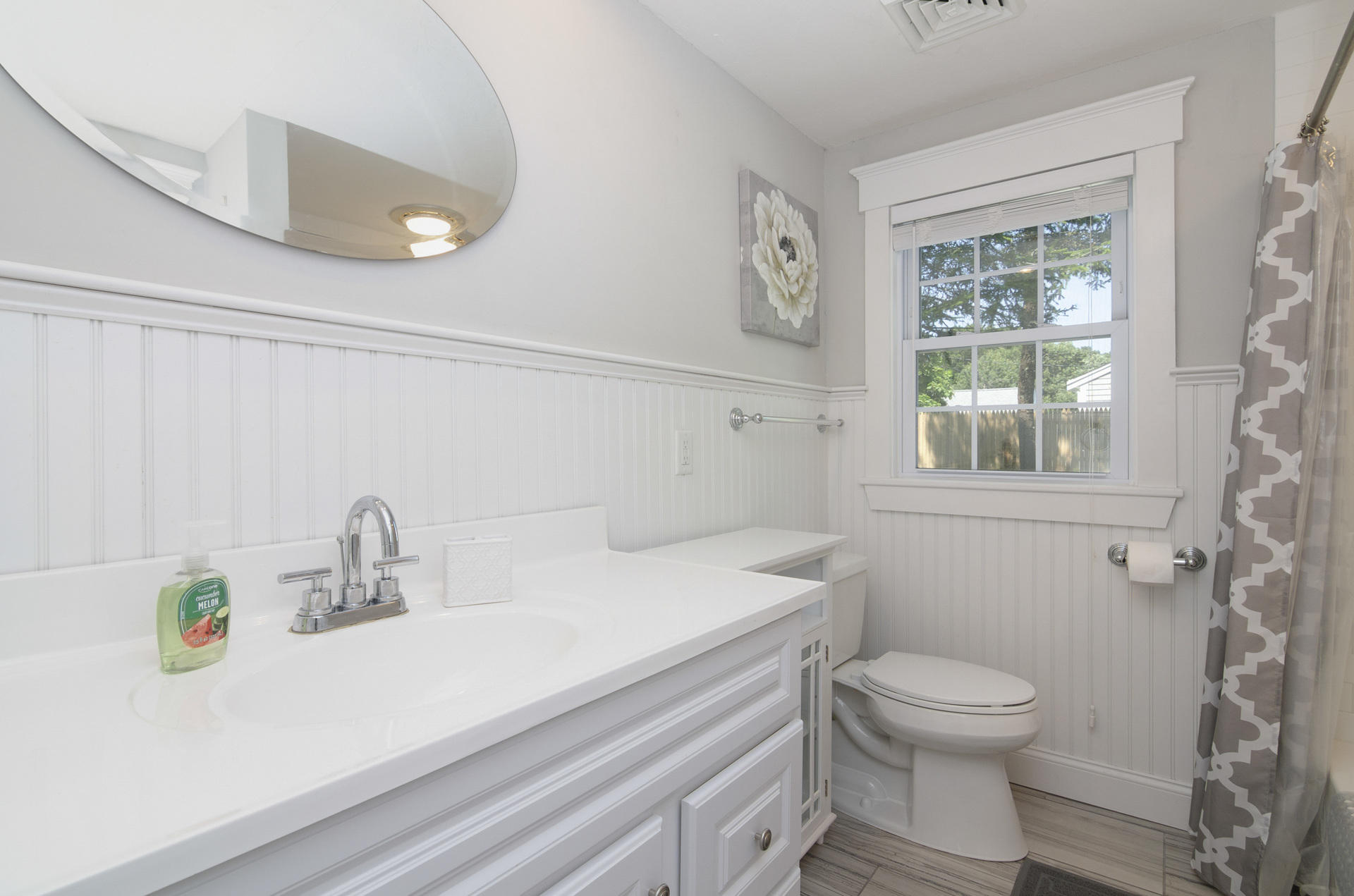 31 Glendon Road Dennis Port, MA 02639 - Photo 16 of 21 a bathroom with a sink a toilet and a window