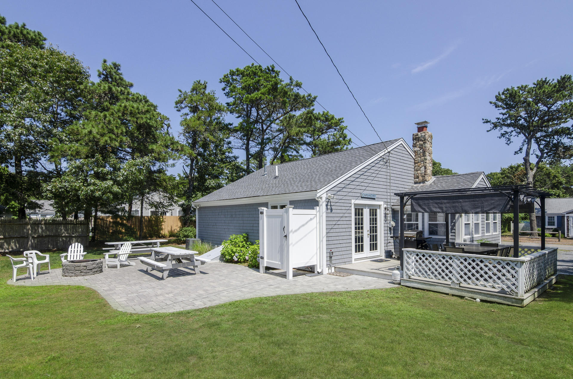 31 Glendon Road Dennis Port, MA 02639 - Photo 18 of 21 a view of a house with backyard and sitting area