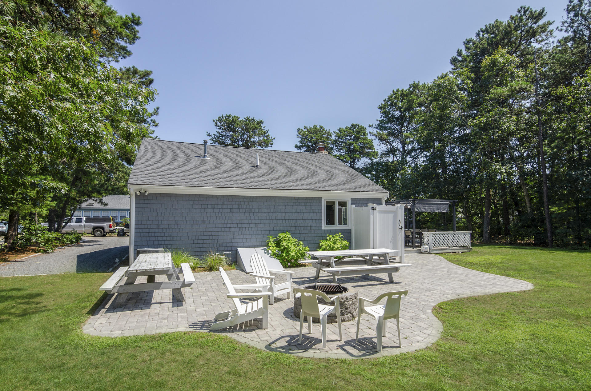 31 Glendon Road Dennis Port, MA 02639 - Photo 19 of 21 a view of a house with backyard sitting area and garden