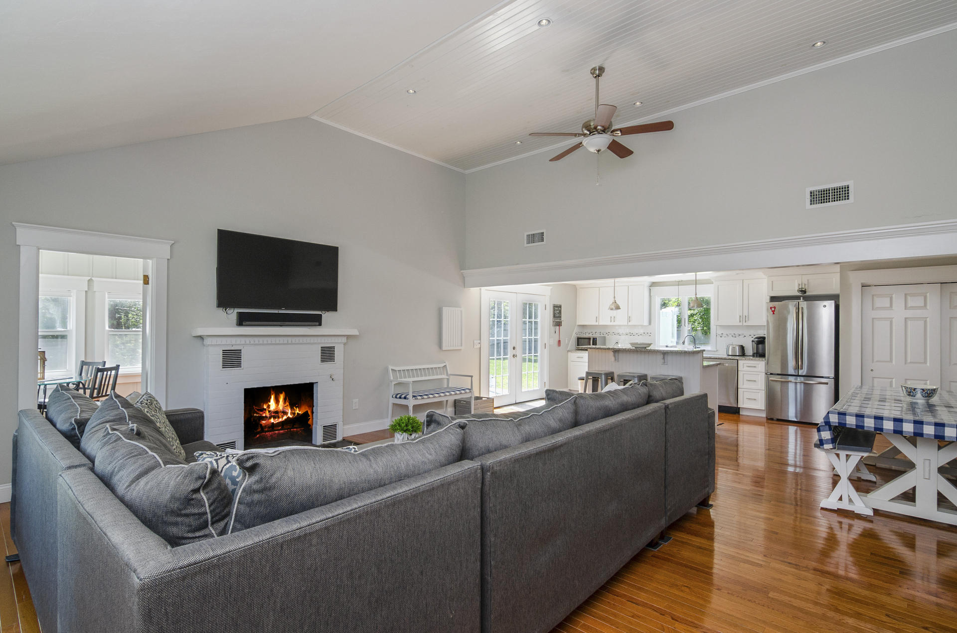 31 Glendon Road Dennis Port, MA 02639 - Photo 5 of 21 a living room with fireplace furniture and a flat screen tv