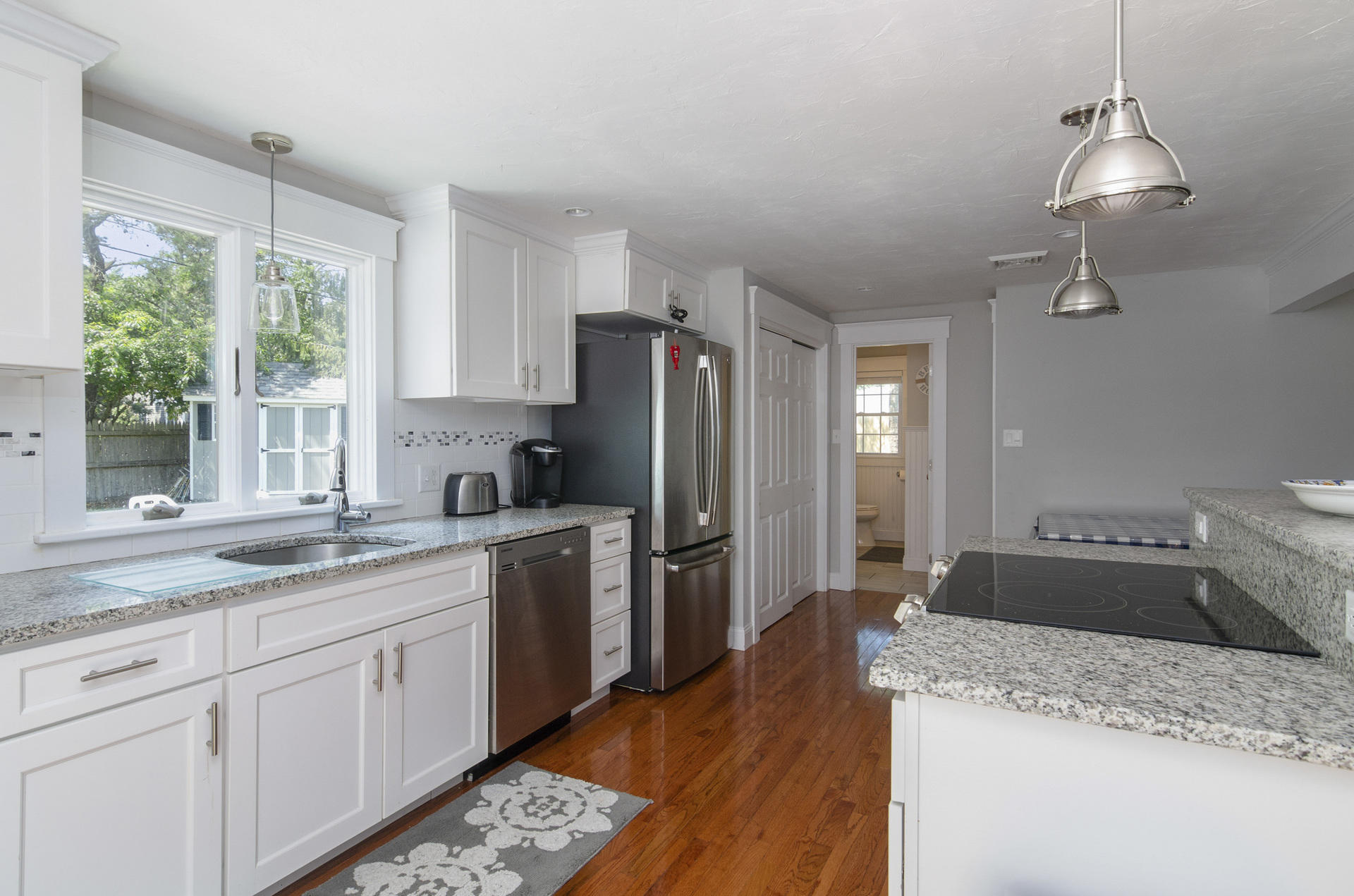 31 Glendon Road Dennis Port, MA 02639 - Photo 6 of 21 a kitchen with a sink stove and refrigerator