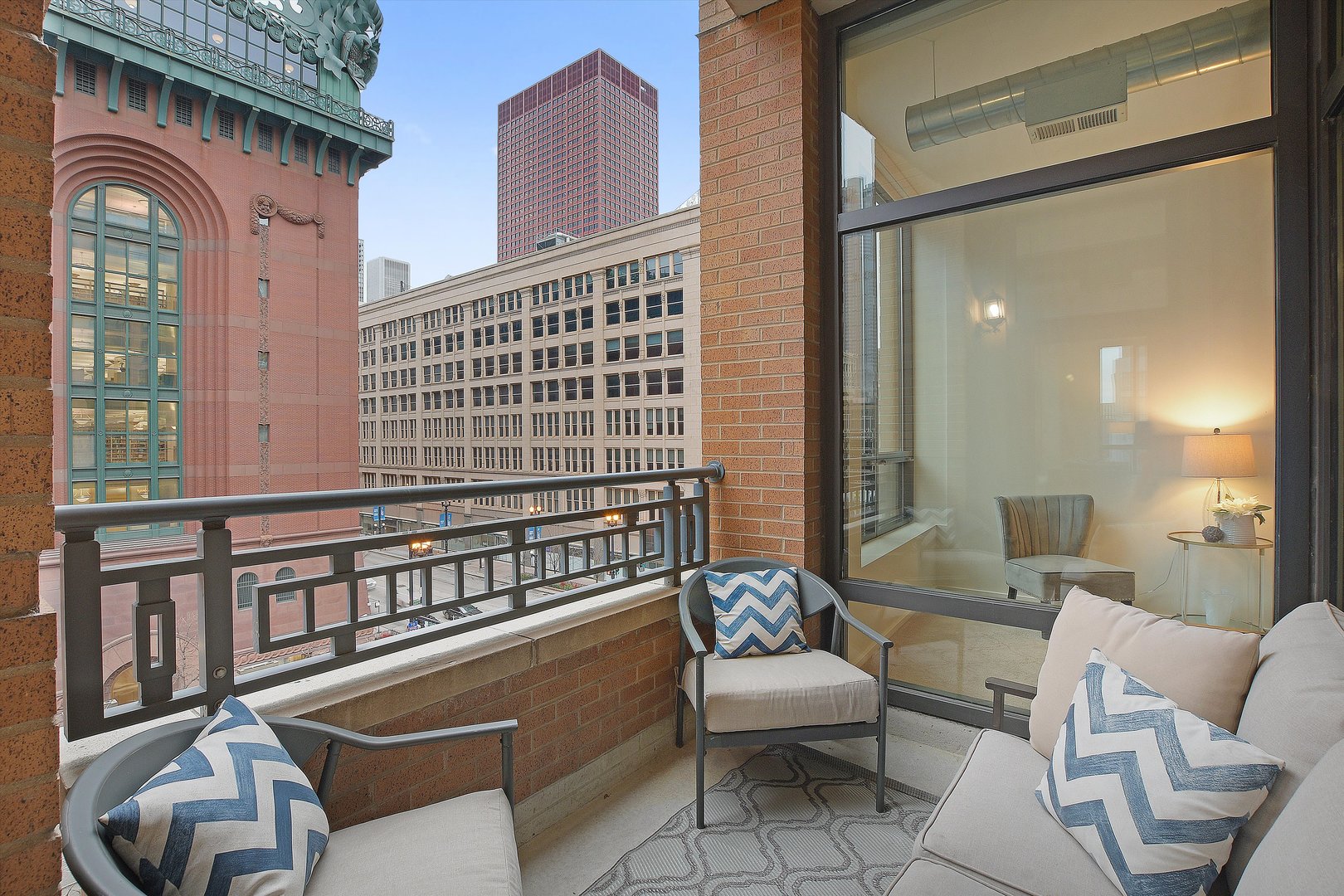 520 South State Street, Unit 510 Chicago, IL 60605 - Photo 6 of 34 a view of a balcony with furniture