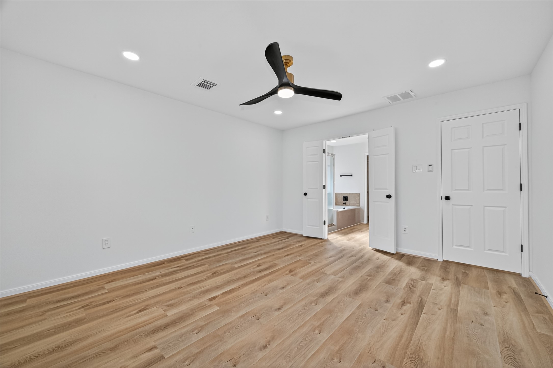 17422 Bending Post Drive Houston, TX 77095 - Photo 29 of 48 a view of empty room with wooden floor