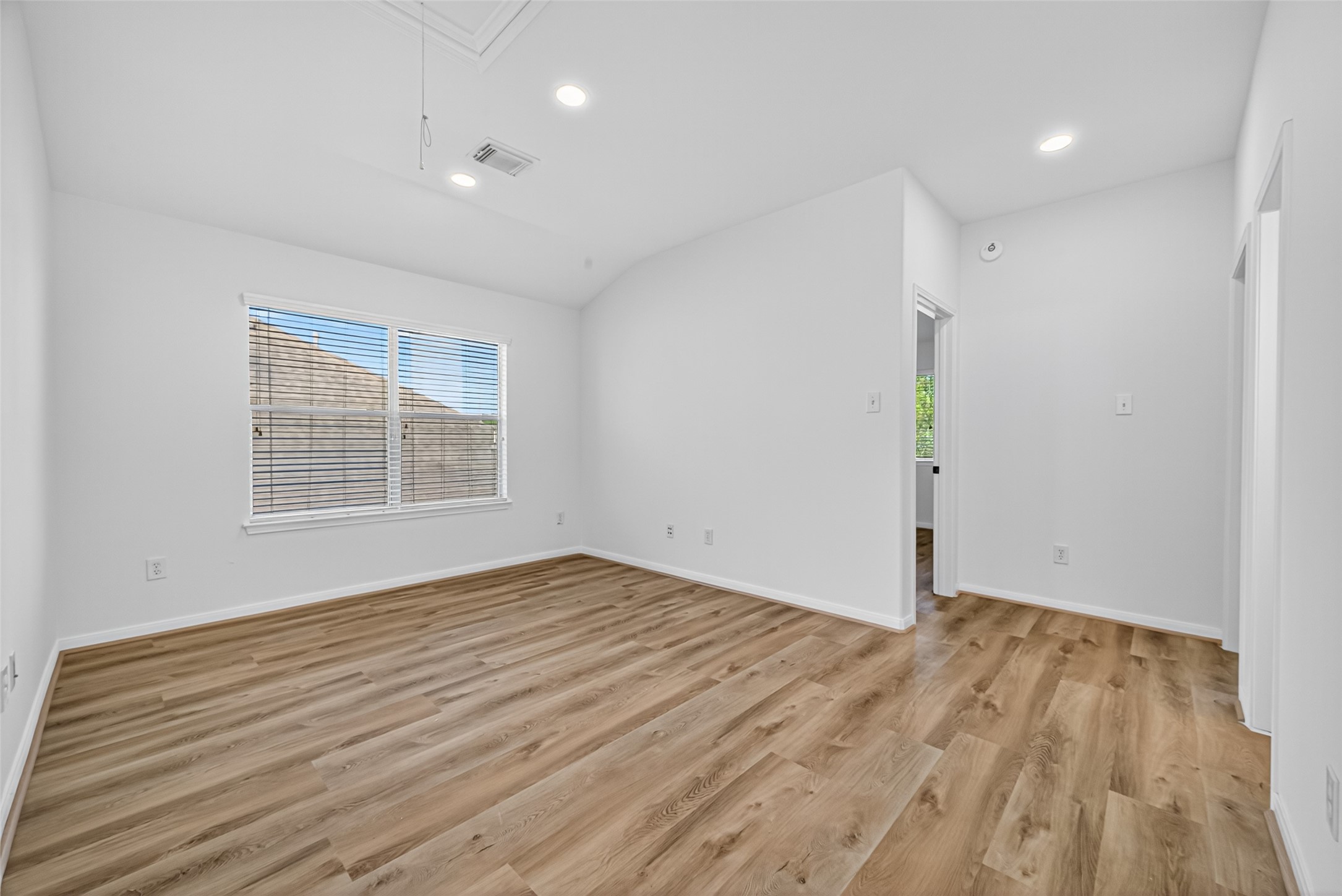17422 Bending Post Drive Houston, TX 77095 - Photo 34 of 48 wooden floor in an empty room with a window