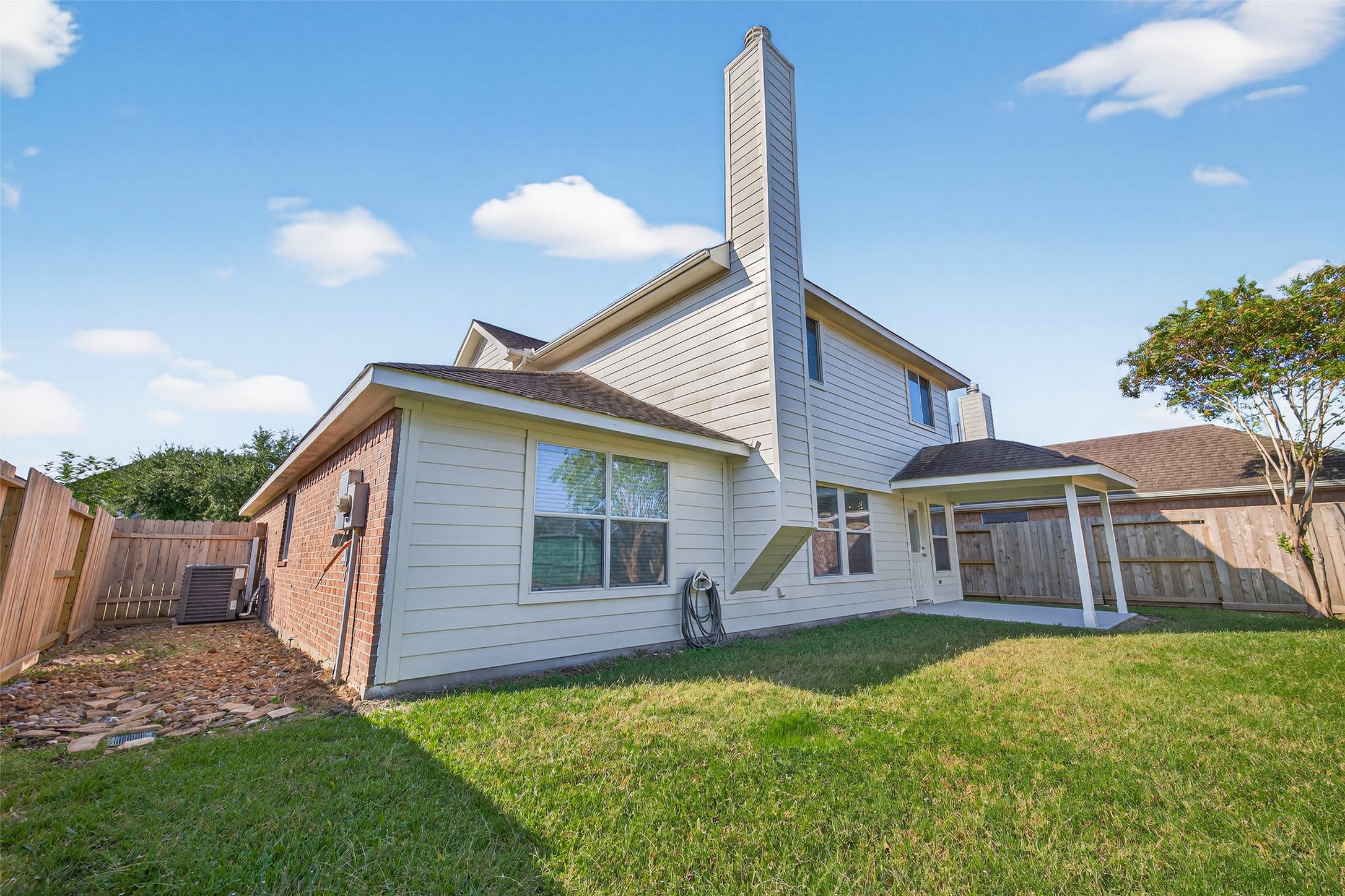 17422 Bending Post Drive Houston, TX 77095 - Photo 47 of 48 a front view of a house with a garden and porch