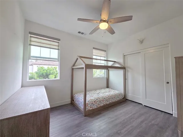 a room that has a bed and a window