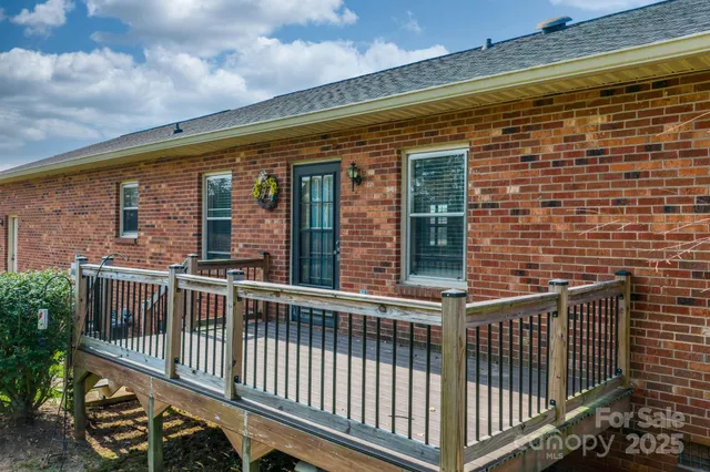a view of a brick building from a balcony