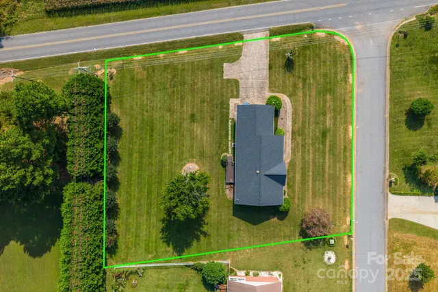 a bathroom with a shower and a mirror