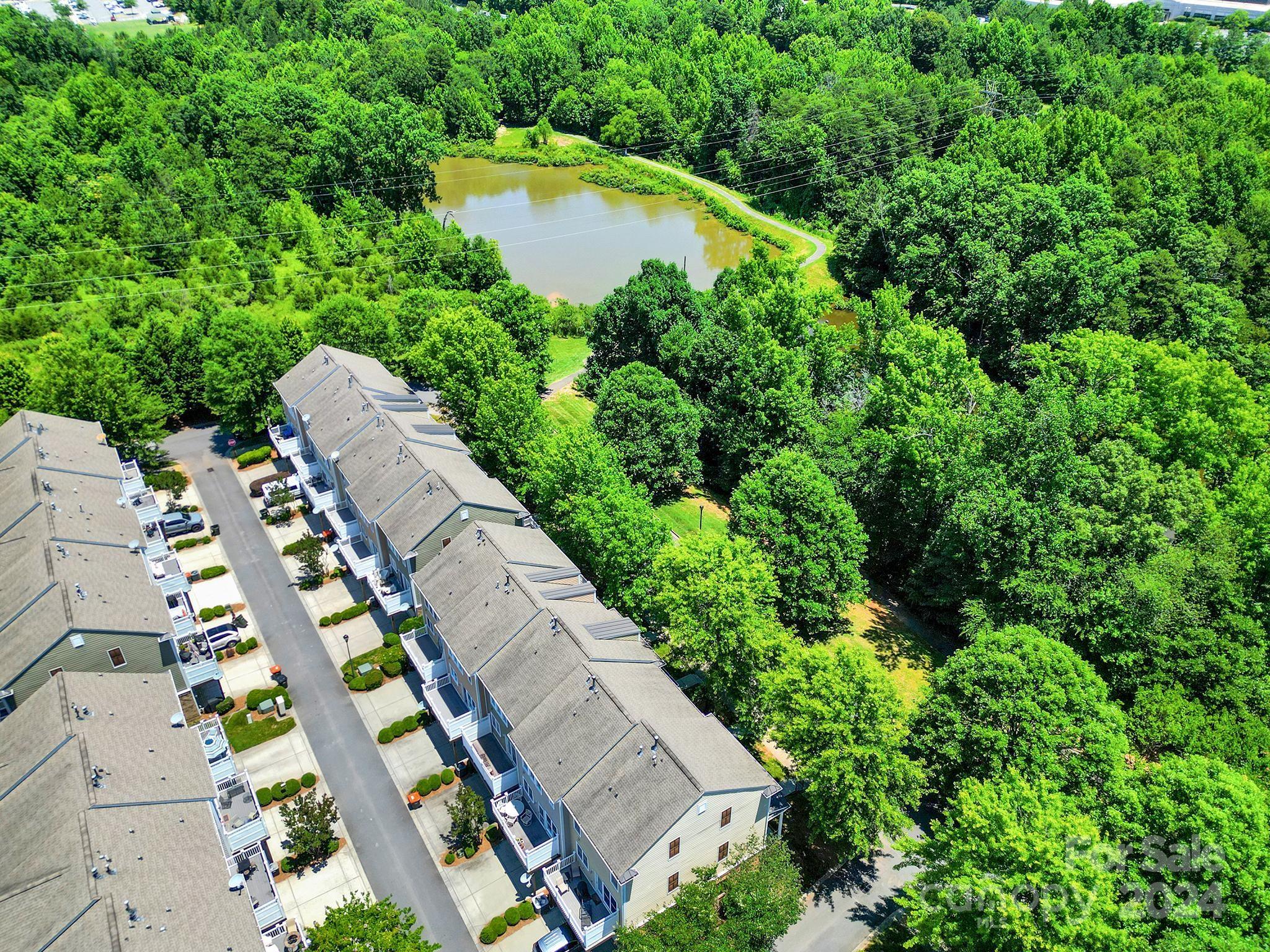 1074 Drayton Court Fort Mill, SC 29708 - Photo 3 of 37 an aerial view of residential house with outdoor space and swimming pool