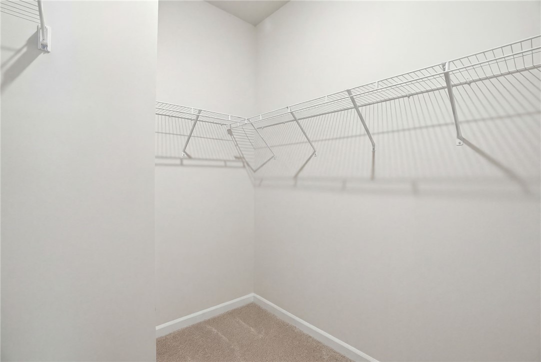 331 Lilac Loop Greenwood, SC 29646 - Photo 16 of 27 Functional closet space provides convenient storage solutions for any wardrobe.