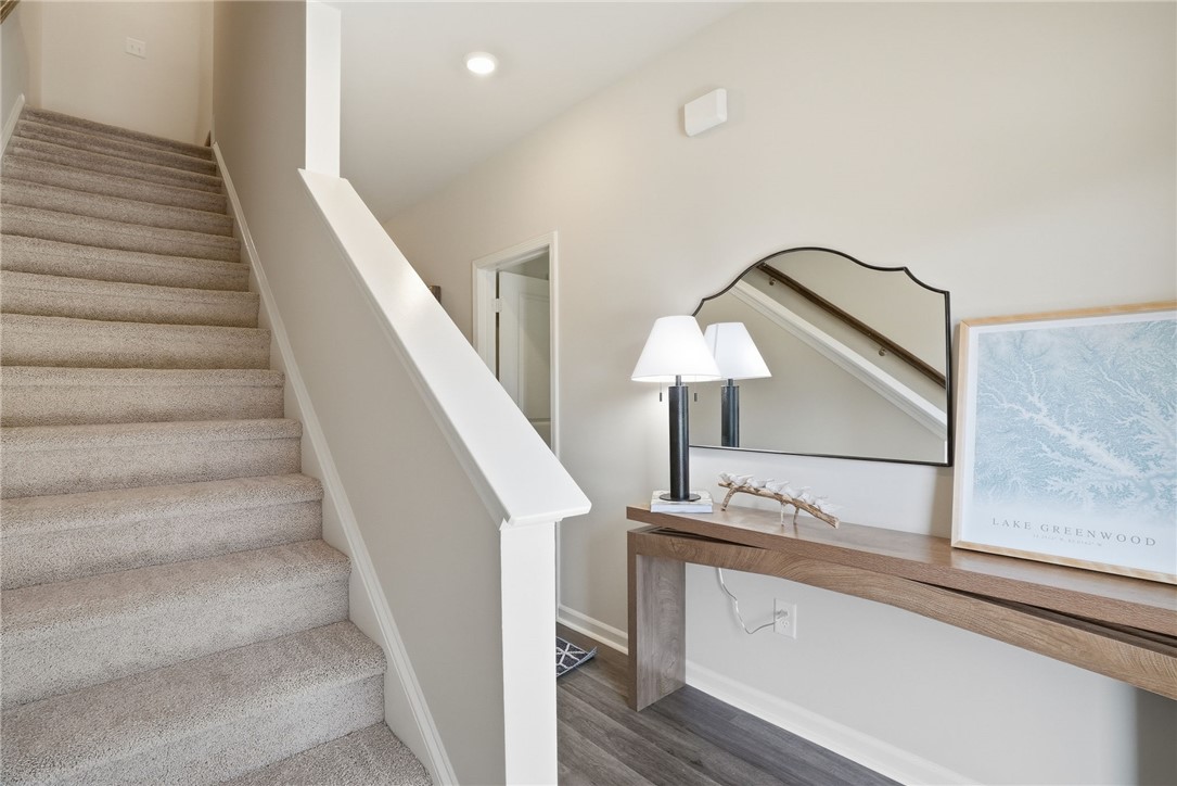 331 Lilac Loop Greenwood, SC 29646 - Photo 3 of 27 This inviting entryway features an elegant staircase, creating a warm welcome.