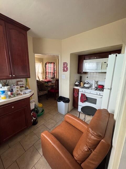 205 West Lancaster Boulevard Lancaster, CA 93534 - Photo 7 of 12 a living room with furniture and a window