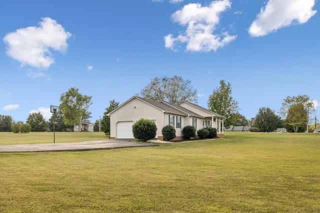 a view of a house with a ocean view