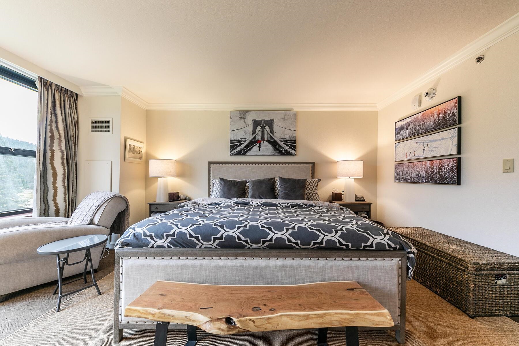 400 Resort Road, Unit 822 824 Olympic Valley, CA 96146 - Photo 11 of 28 a bedroom with a bed and wooden floor