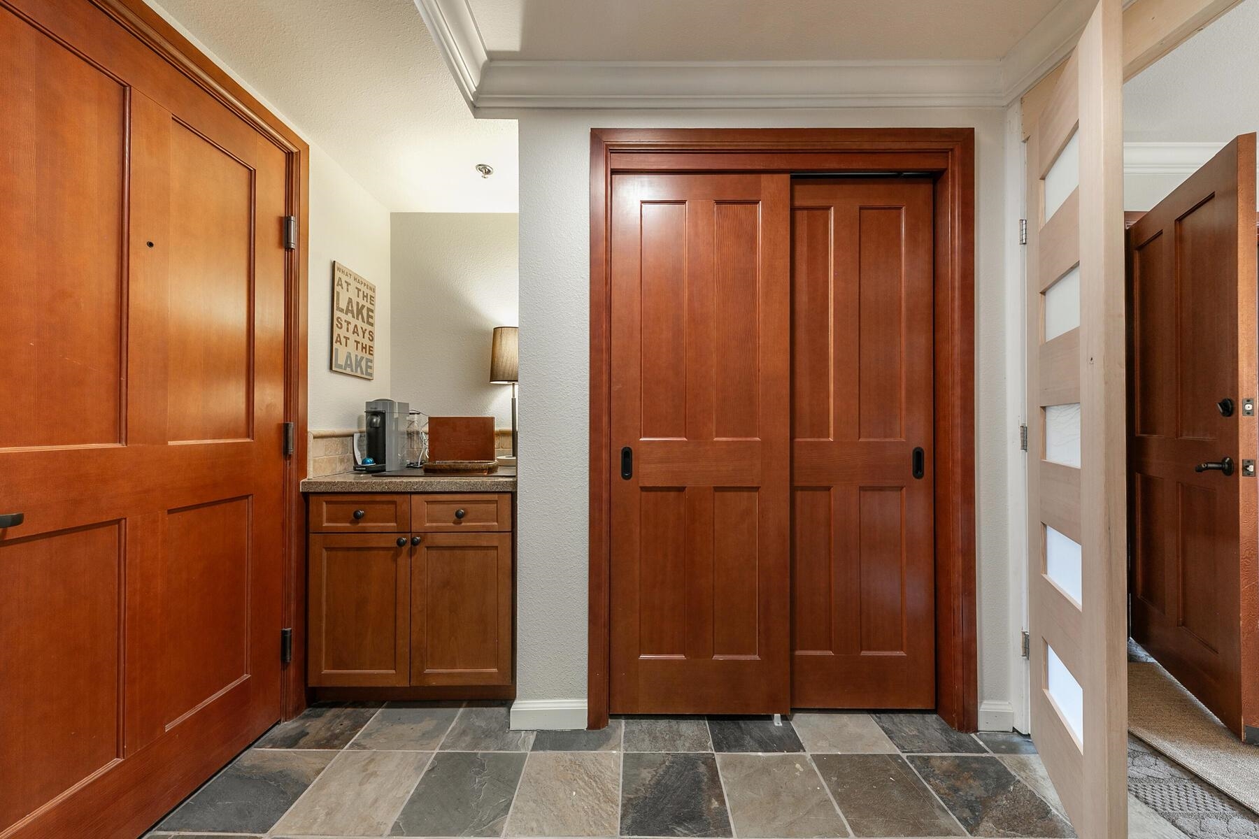 400 Resort Road, Unit 822 824 Olympic Valley, CA 96146 - Photo 14 of 28 a bathroom with a granite countertop sink and a mirror