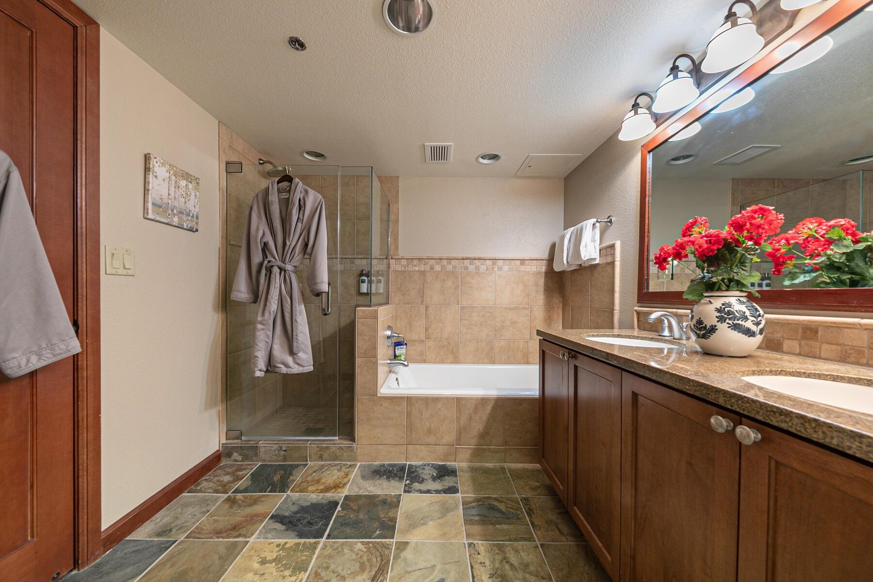 400 Resort Road, Unit 822 824 Olympic Valley, CA 96146 - Photo 20 of 28 a bathroom with a sink and a shower