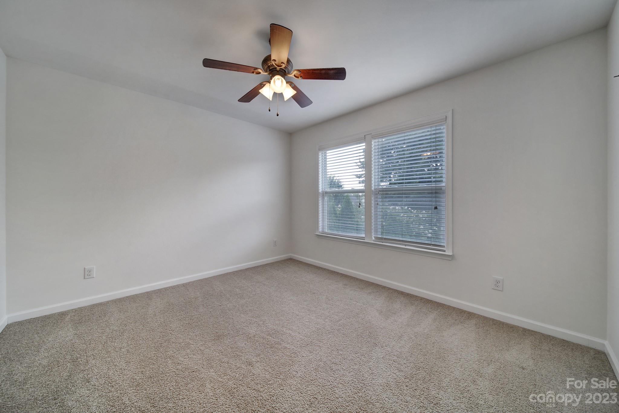 3359 Mandrake Court Tega Cay, SC 29708 - Photo 14 of 33 a view of an empty room with a window