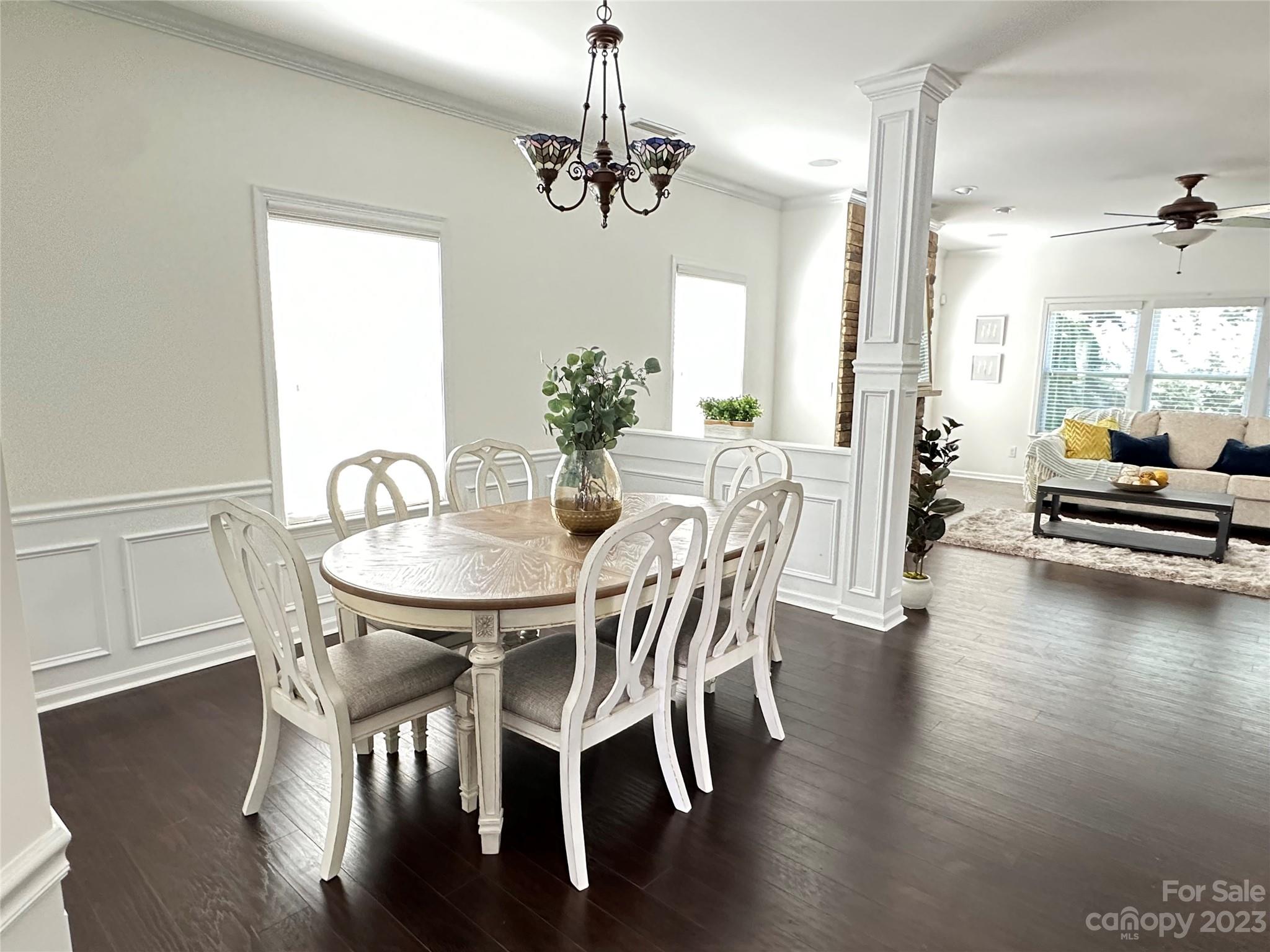 3359 Mandrake Court Tega Cay, SC 29708 - Photo 3 of 33 a view of a dining room with furniture window and wooden floor