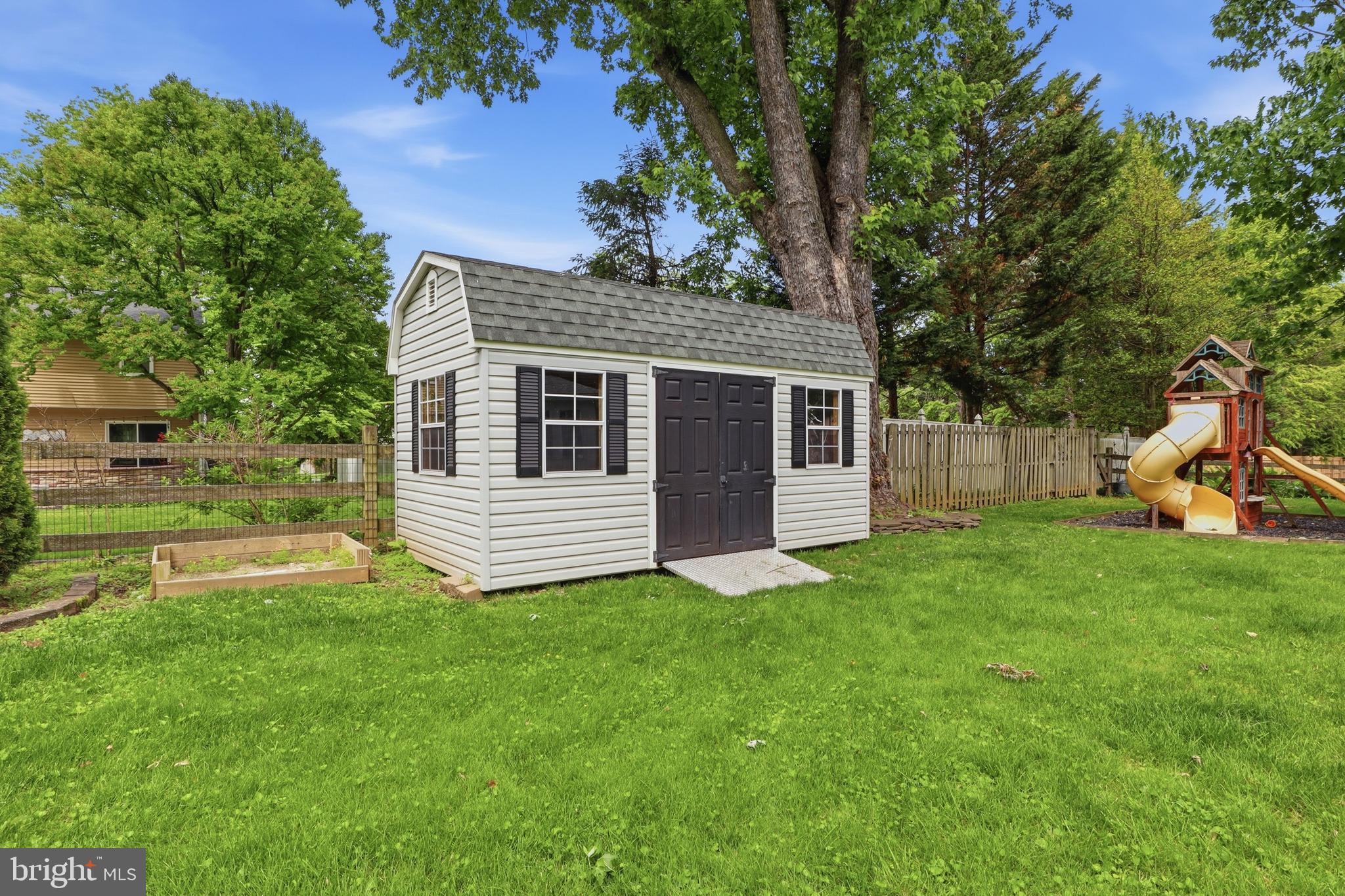 1072 Lambley Road Landisville, PA 17538 - Photo 16 of 46 a view of a house with a backyard