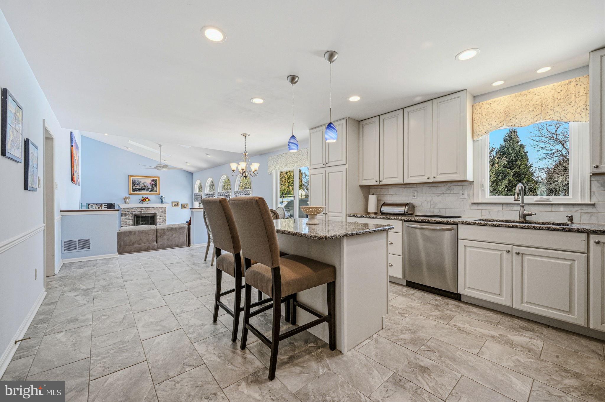 10 Auspice Circle Newark, DE 19711 - Photo 12 of 42 a kitchen with a sink cabinets and window