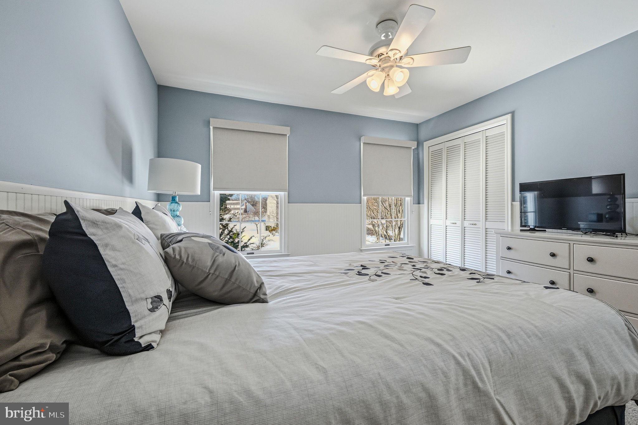 10 Auspice Circle Newark, DE 19711 - Photo 34 of 42 a bedroom with a large bed and a flat screen tv